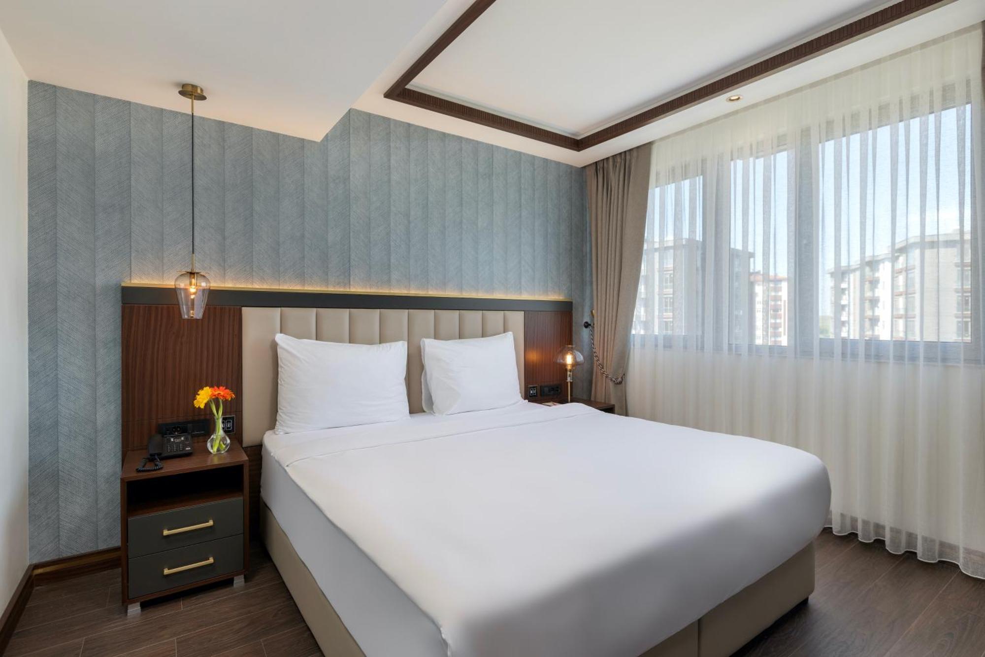 Miracle Istanbul Asia Airport Hotel & Spa Istambul Exterior foto A bedroom at the hotel